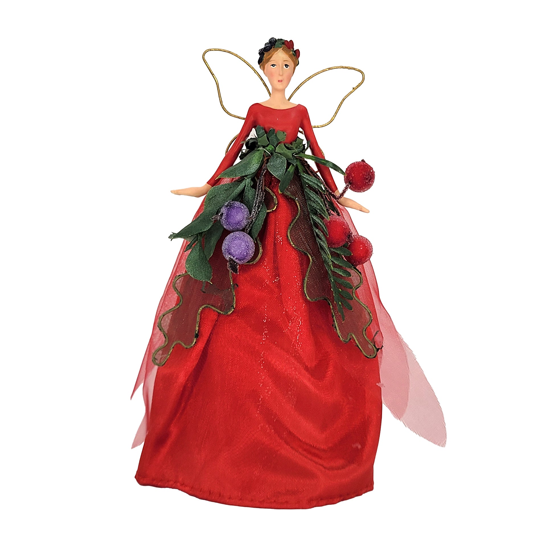 A Christmas fairy ornament with a long red gown, green leafy garland, red and purple frosted berries, and gold wings, shown on a plain white background.