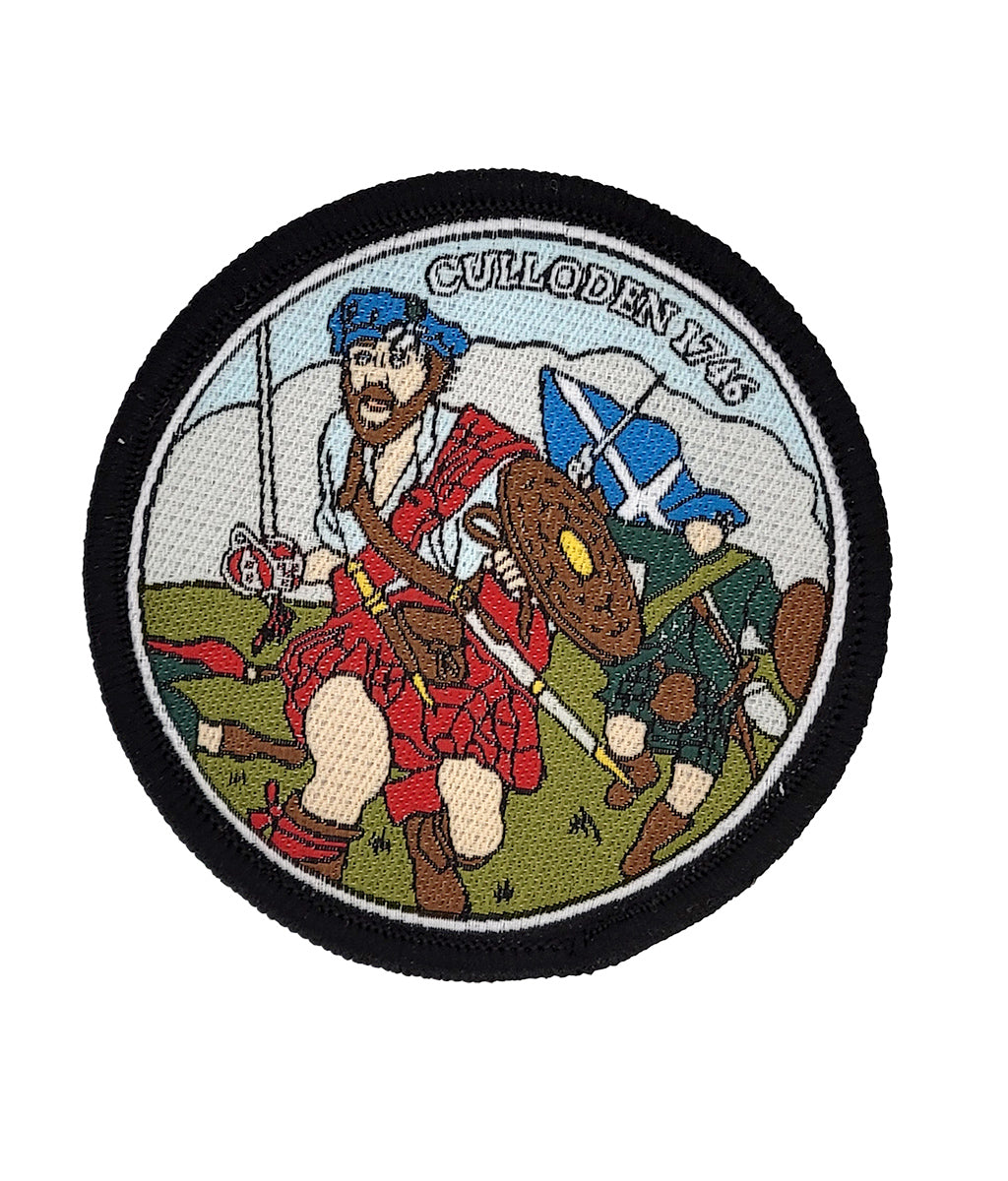 Round patch with a historical scene featuring a man in red tartan and blue hat, with text 'Culloden 1746'.
