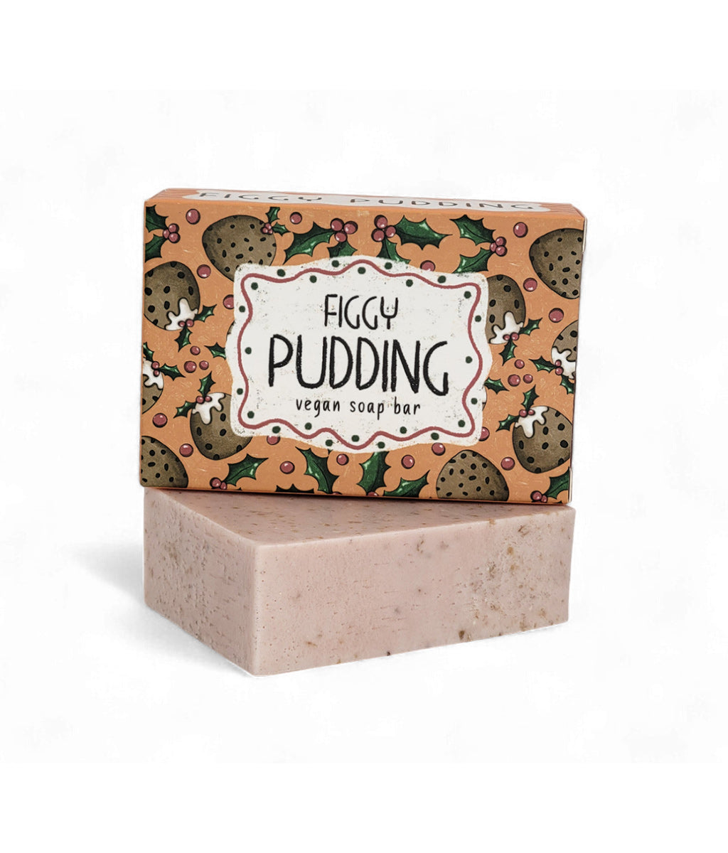 Figgy pudding soap bar with packaging on a white background