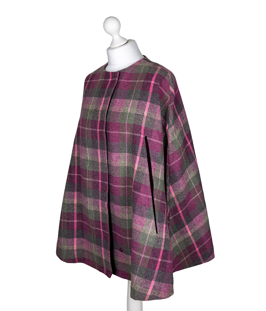 Earth Squared Berry Tweed Wrap on a mannequin against a white background