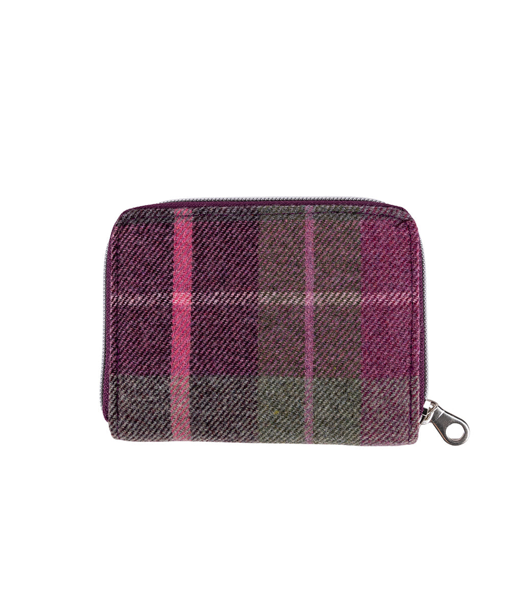 Plaid patterned wallet with a zipper on a white background