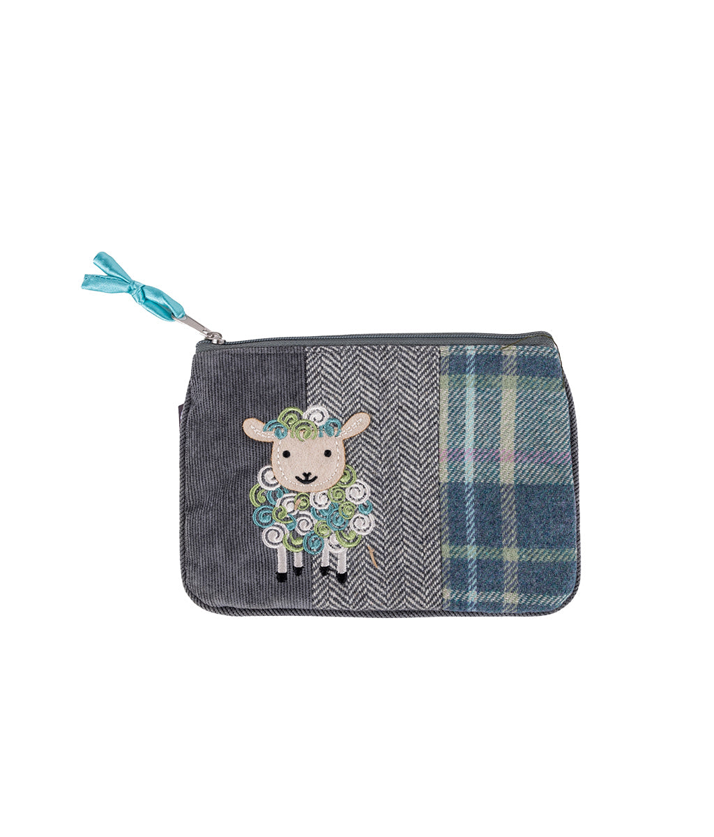 Meadow Tweed Sheep Purse with a sheep design on a white background