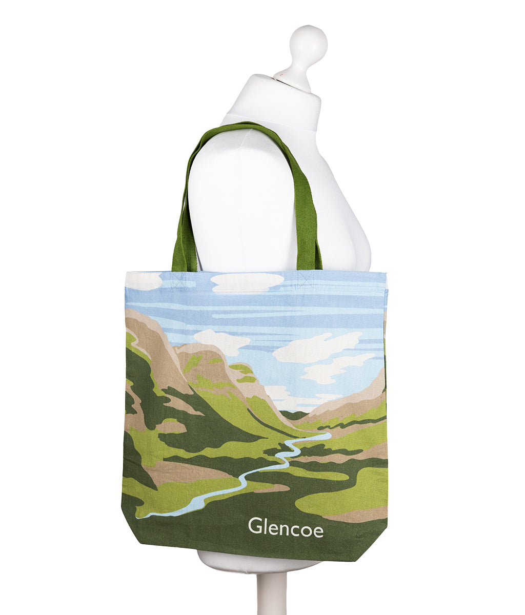 Tote bag with a scenic design of Glencoe on a mannequin against a white background