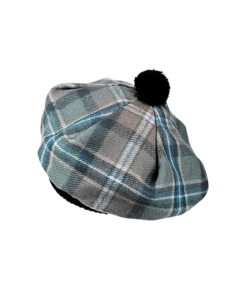 Spirit of Culloden Tartan Tammy Hat with a black pom-pom on a white background