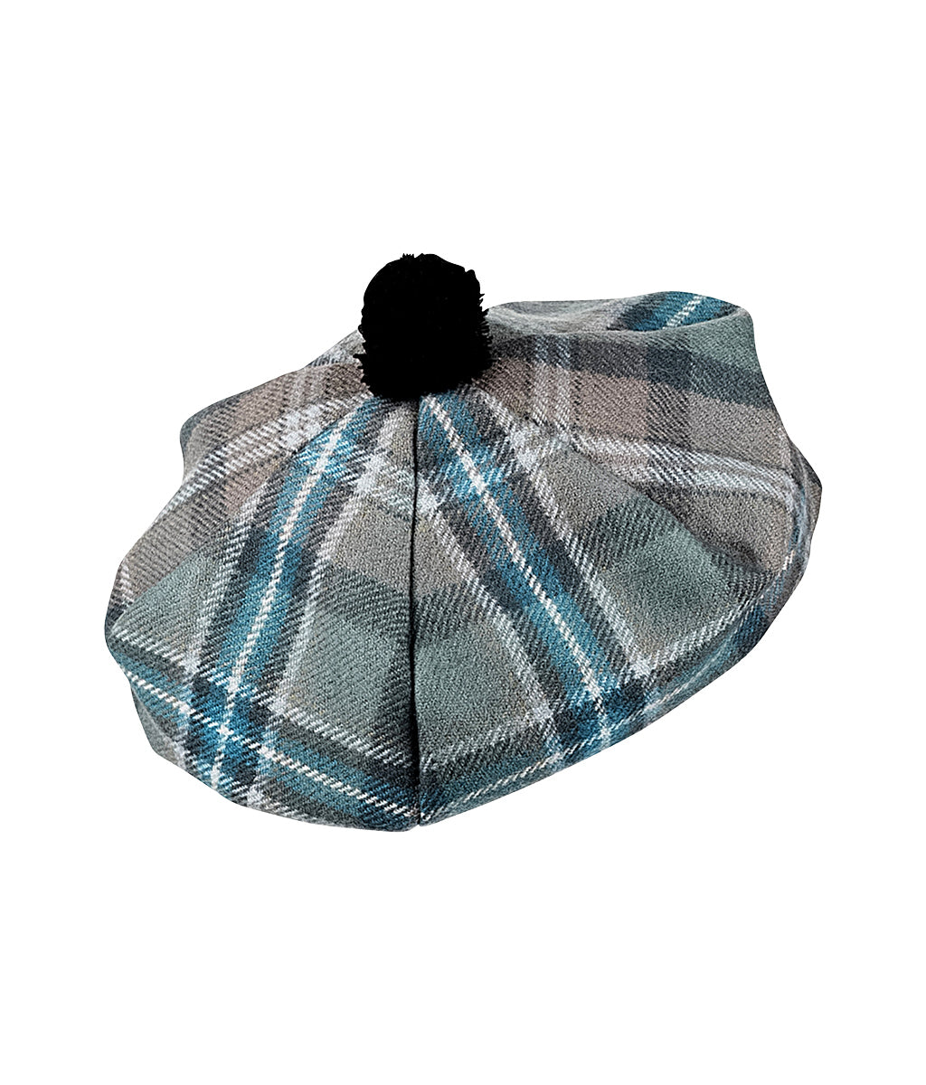 Spirit of Culloden Tartan Tammy Hat with a black pom-pom on a white background