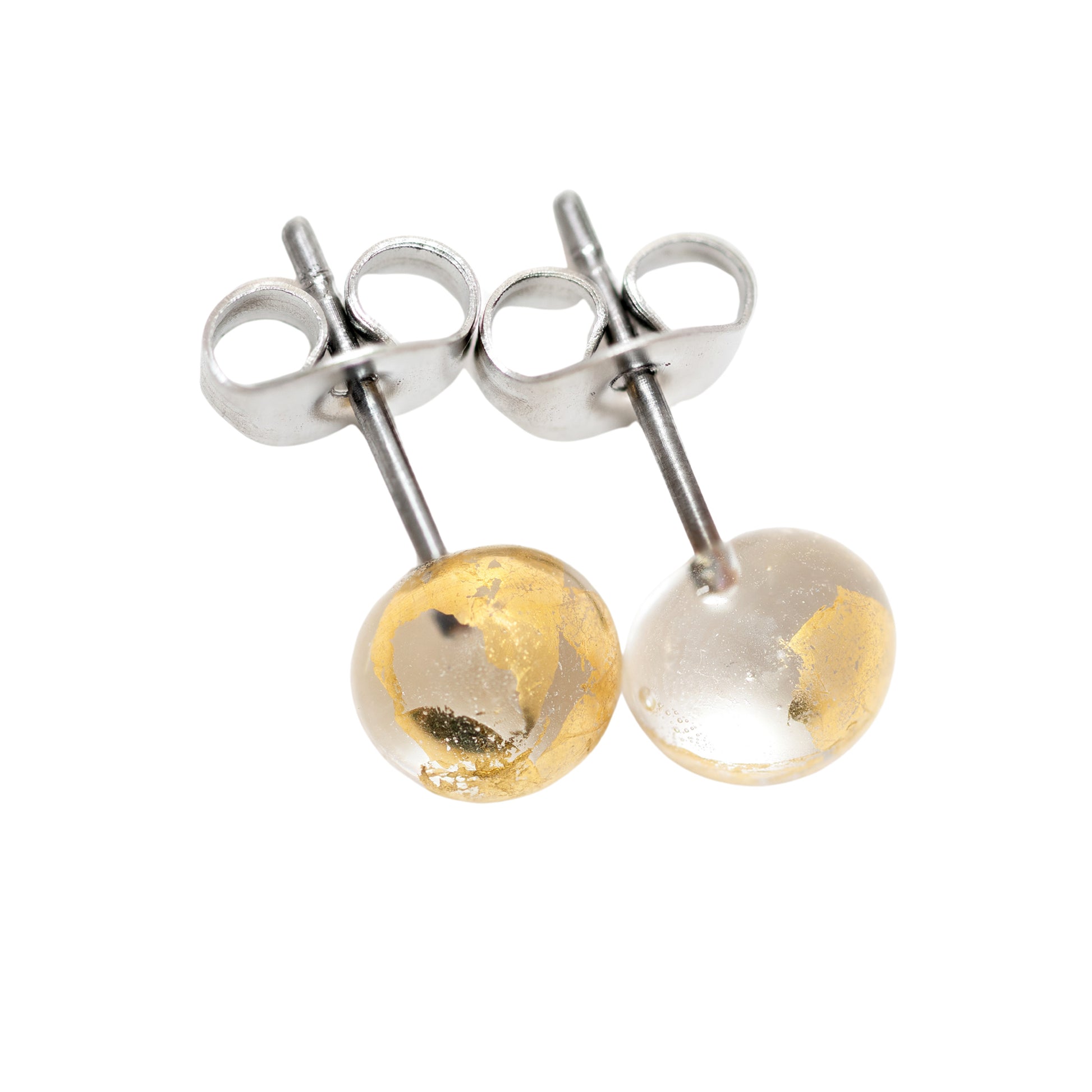 A pair of recycled whisky bottle clear glass and gold stud earrings, shown from the back on a solid white background.