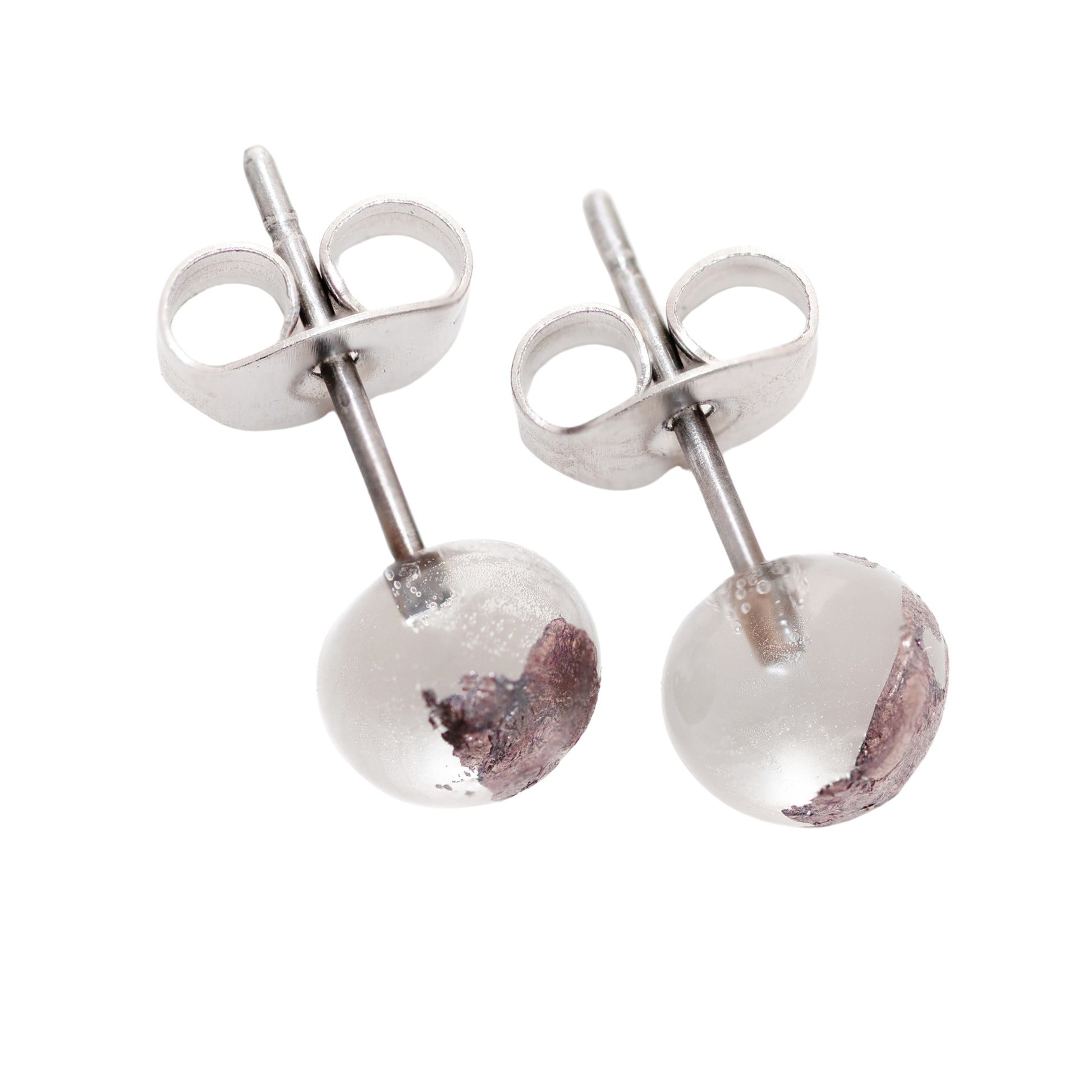 A pair of recycled whisky bottle clear glass and palladium stud earrings, shown on a plain white background.
