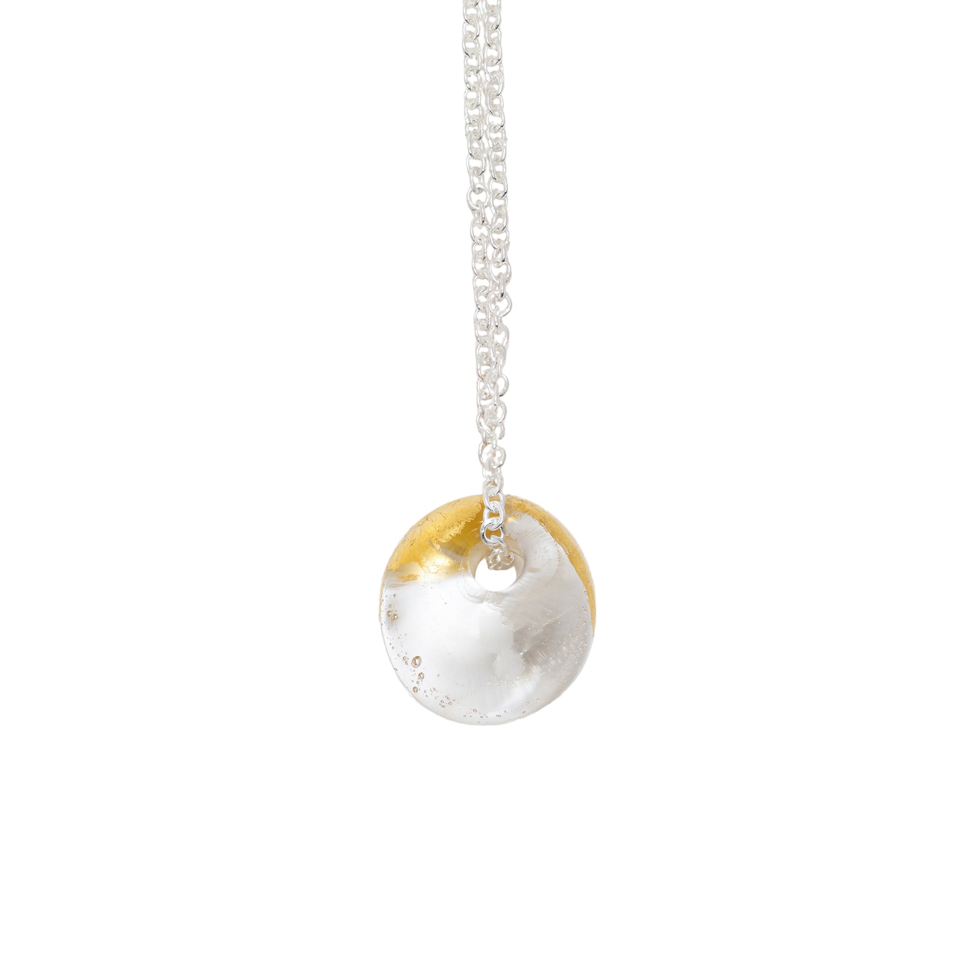 A recycled whisky bottle clear glass and gold pendant on Sterling Silver Chain featuring a clear glass and gold finish, shown against a plain white background.