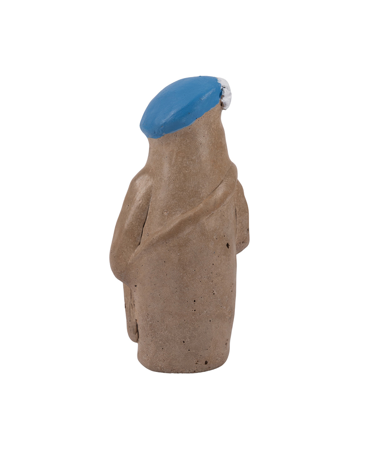 Ceramic figure with a blue hat on a white background