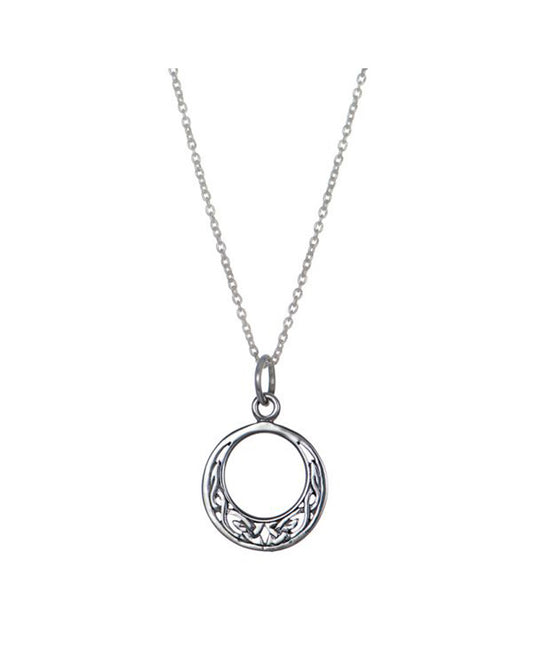 A silver necklace featuring a circular pendant with an open center and decorative cutout details along the lower half, suspended from a delicate link chain against a plain white background.