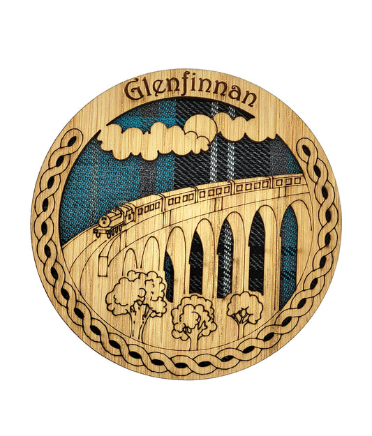 Wooden coaster with Glenfinnan viaduct design and 'Glenfinnan' text on a white background