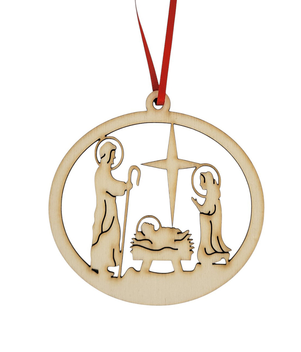 Wooden Christmas ornament with nativity scene design on a white background