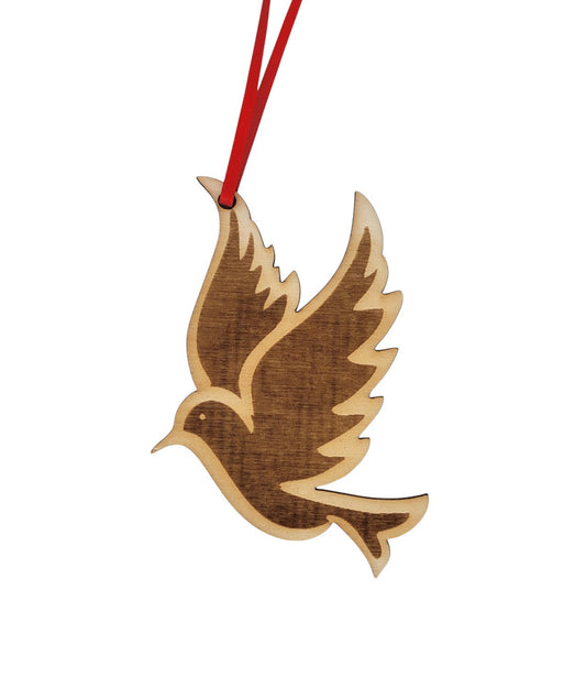 Wooden dove ornament with a red string on a white background
