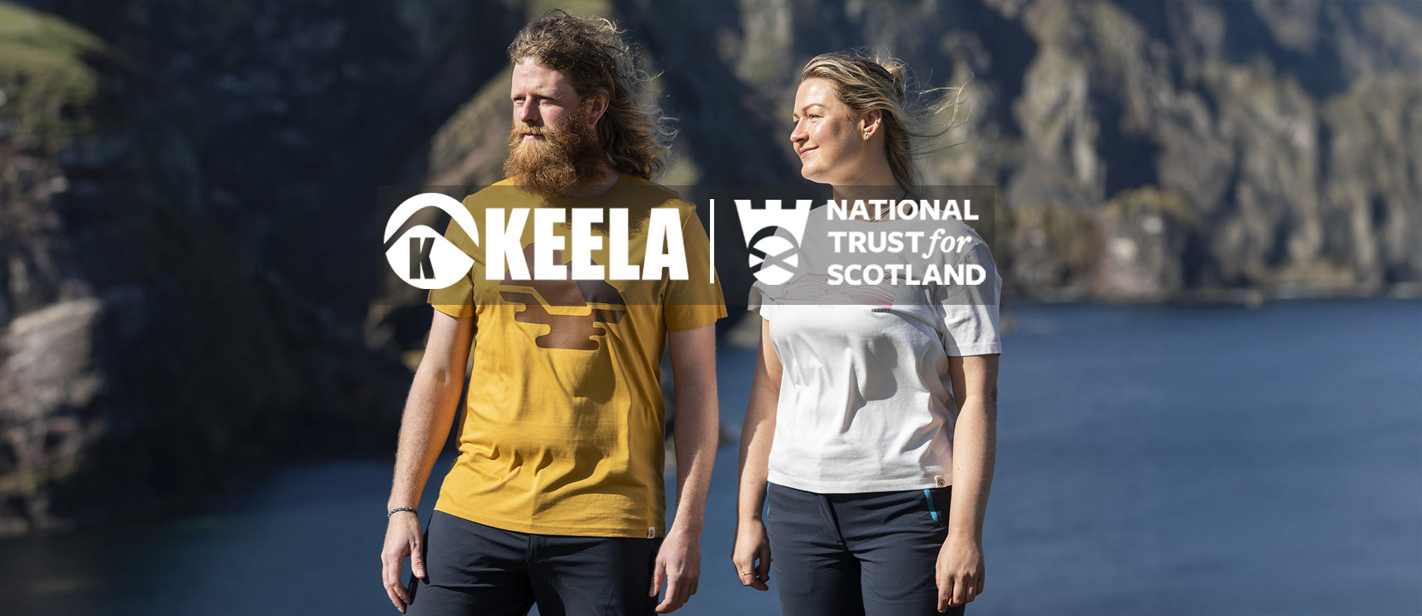 Two people standing by the sea with 'Keela' and 'National Trust of Scotland' logos.