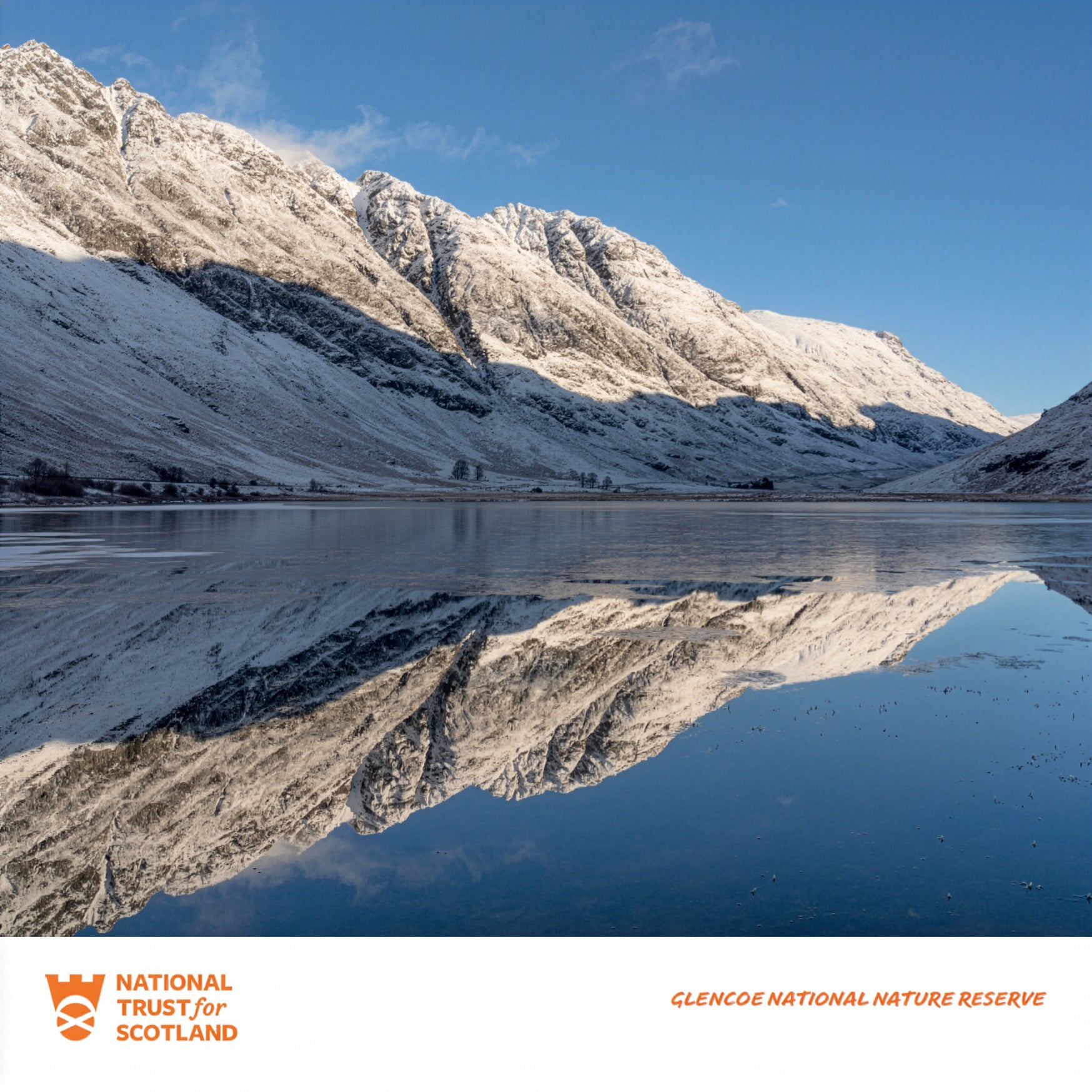 Snow-covered mountains reflected in a Glencoe Nature Reserve with 'National Trust for Scotland' logo at the bottom.